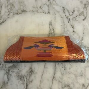 Clutch, New in Original Packaging